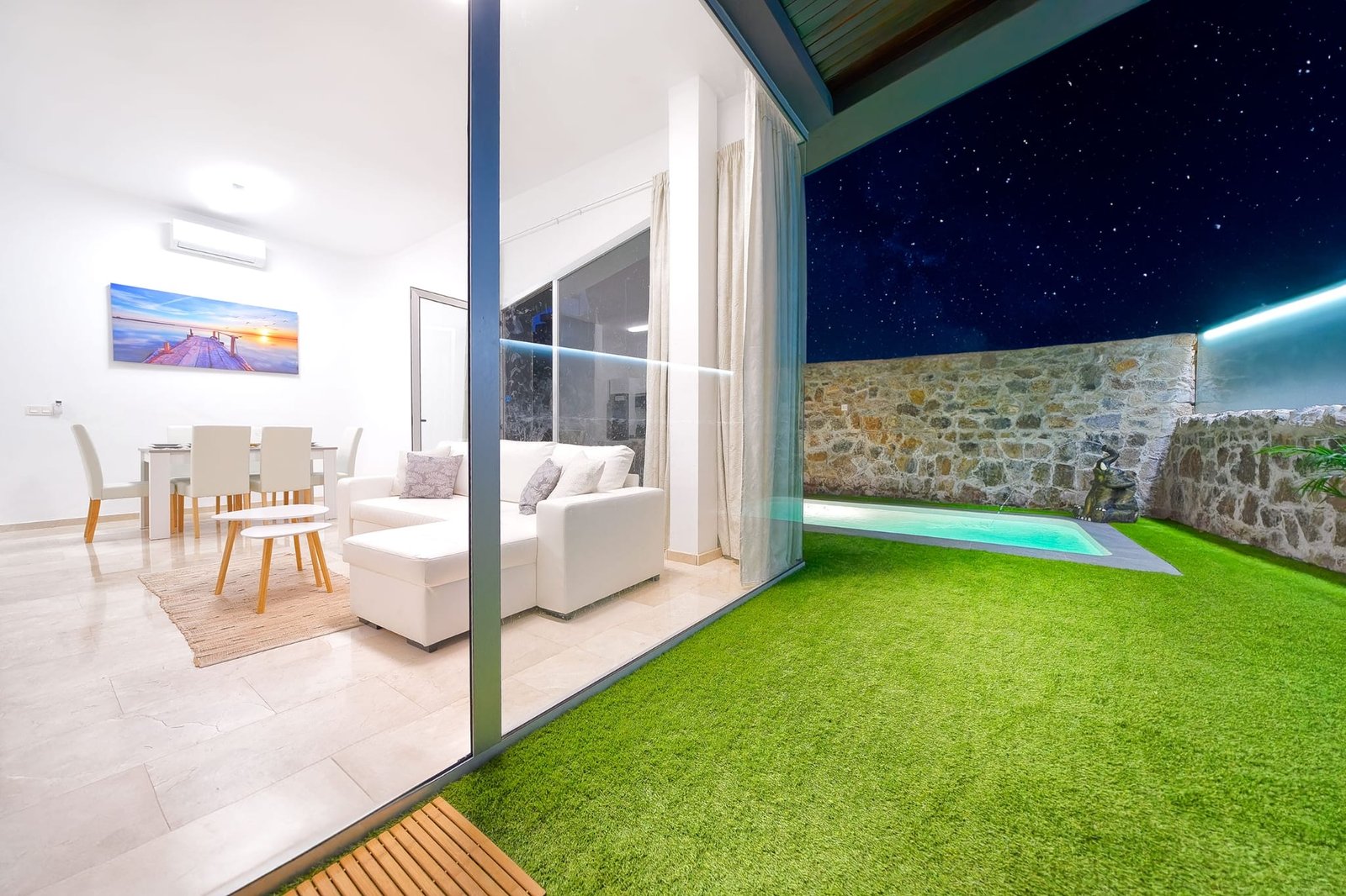 Entrance to the main living room, overlooking the garden and heated pool - Villa Estación 1 - Salobre Resort
